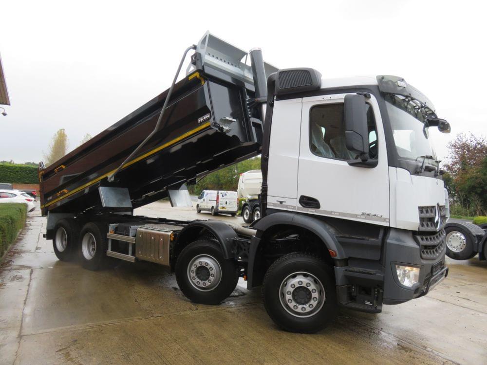 Black Tipper lorry with back up