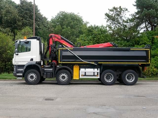 Black Tipper lorry with back up